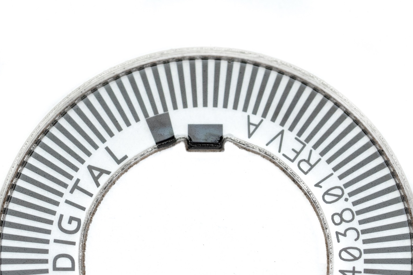 One of two tabs that protrude into the inner circle. The tabs fit into grooves on the hub and ensure that the small disk is held securely by the hub, a patent pending process.